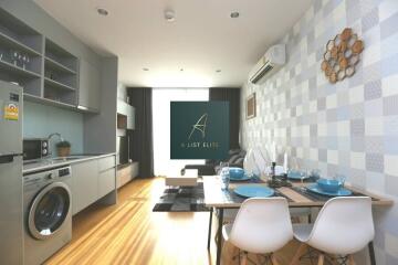 Modern living area with kitchen and dining space