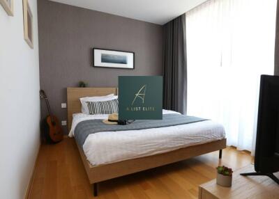 Modern bedroom with wooden flooring