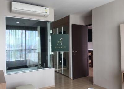 Modern bedroom with glass partition and air conditioner