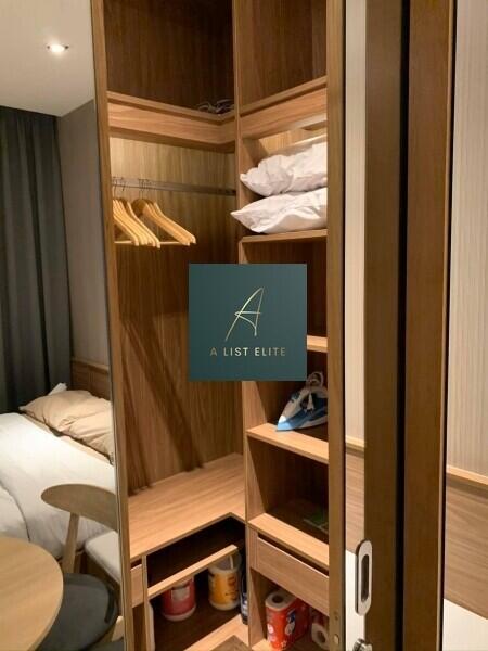 Bedroom with an open wardrobe