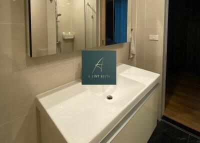 Modern bathroom with large vanity and mirrors