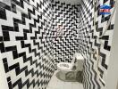 Bathroom with black and white zigzag tile pattern