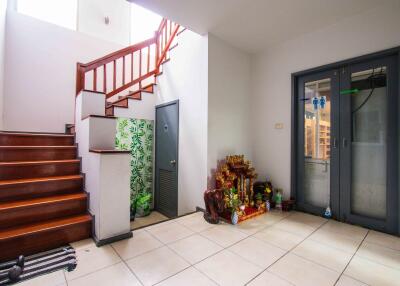 Hallway with staircase and decorated area