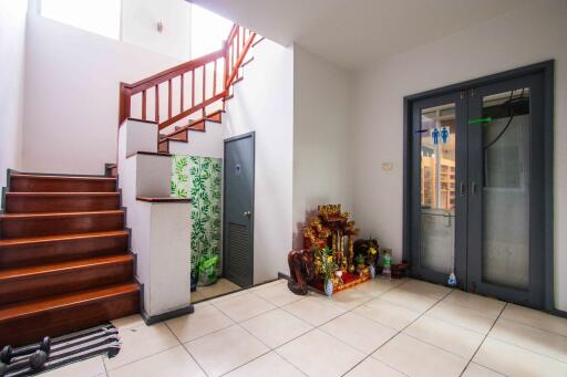 Hallway with staircase and decorated area