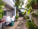 Green and lush garden with patio seating