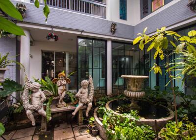 Courtyard with ornamental fountain and sculptures