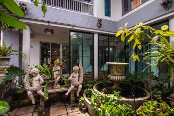 Courtyard with ornamental fountain and sculptures