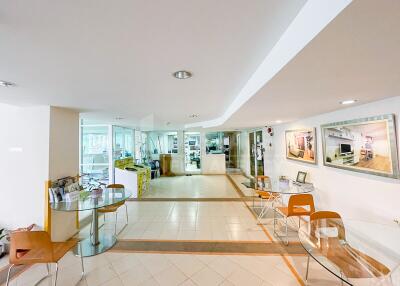 Entry lobby area with seating and reception desk