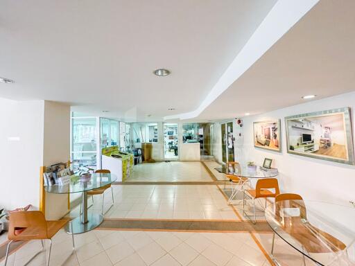 Entry lobby area with seating and reception desk