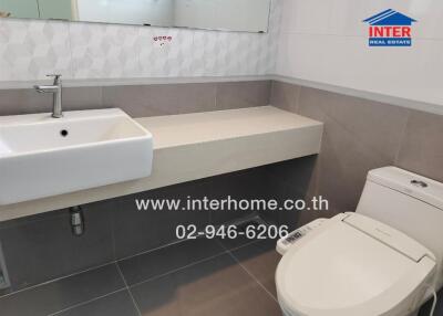 Modern bathroom with sink and toilet