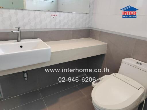 Modern bathroom with sink and toilet