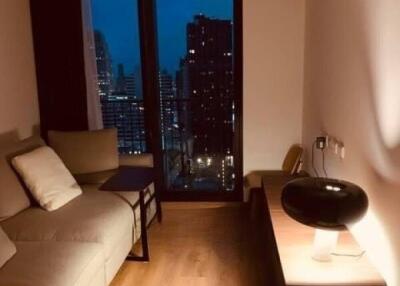 Modern living room at night with city view