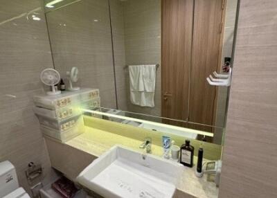 Modern bathroom with large mirror and sink