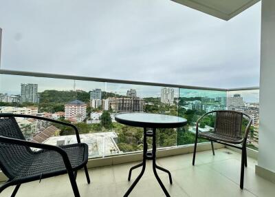 Balcony with outdoor seating and city view