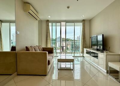 Modern living room with large windows and city view