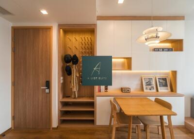 Modern dining area with wooden table and storage shelves