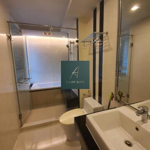 Modern bathroom with glass shower enclosure