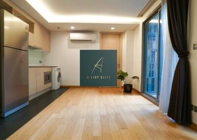 Modern kitchen with wooden flooring and appliances