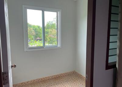 Small bedroom with a window