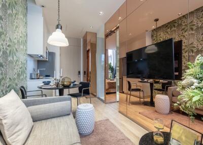 Modern living room with open kitchen and dining area