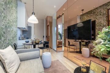 Modern living room with open kitchen and dining area