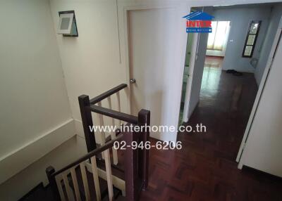 Corridor with wooden stairs and hallways