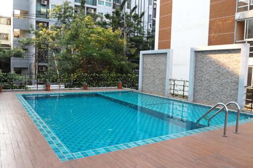 Outdoor swimming pool in residential area