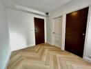 Interior view of a bedroom with wooden doors