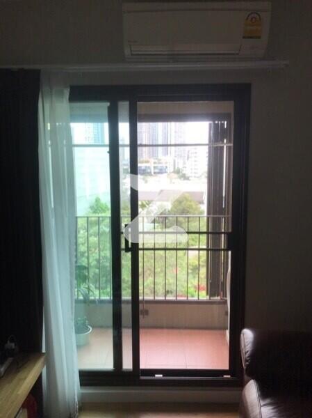 Living room with balcony view