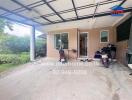 Outdoor parking space and partial view of the house