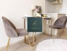 Modern kitchen dining area with velvet chairs and a small table