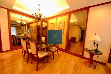 Elegant Dining Room with Wood Flooring and Ceiling Lights