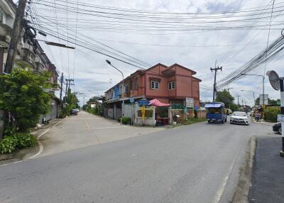 Street view of buildings and a road in an urban area