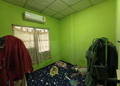 Bedroom with green walls