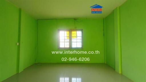 Empty room with green walls