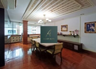 Living area with dining table and decorative lighting