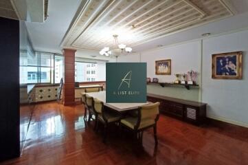 Living area with dining table and decorative lighting