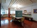 Living area with dining table and decorative lighting