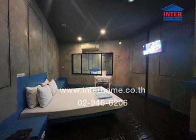 Bedroom with modern decor and dim lighting