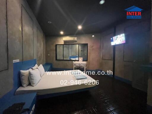 Bedroom with modern decor and dim lighting