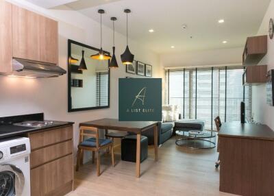 Modern living space with kitchen and dining area