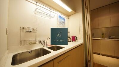 Modern kitchen with double sink and ample storage