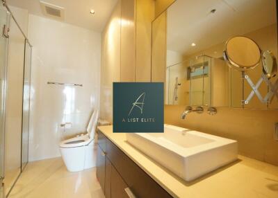 Modern bathroom with large mirror and glass shower