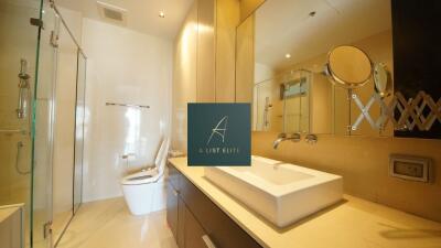 Modern bathroom with large mirror and glass shower