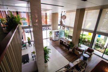 Modern lobby with seating area and large windows