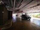 Underground parking space with several parked cars