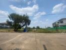 Photo of the exterior vacant lot area