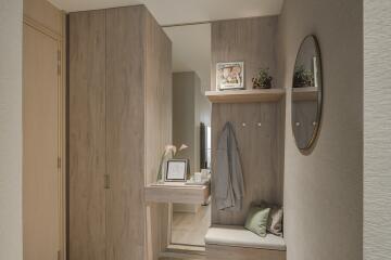 Modern designed entrance hallway with wooden furniture and decor.