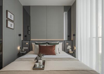 Cozy and modern bedroom with double bed, neutral tones, and decorative accents