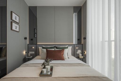 Cozy and modern bedroom with double bed, neutral tones, and decorative accents